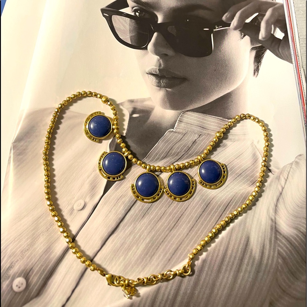 Golden necklace with blue stones